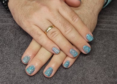 Sparkling blue nails on a towel at Black Cat Collective, Port Elizabeth, Eastern Cape, ZA.