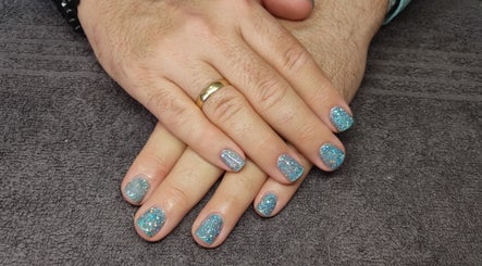 Sparkling blue nails on a towel at Black Cat Collective, Port Elizabeth, Eastern Cape, ZA.