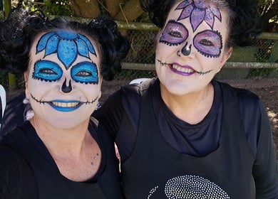 Vibrant face paint at Black Cat Collective, Port Elizabeth, Eastern Cape, ZA. A captivating showcase of creativity.