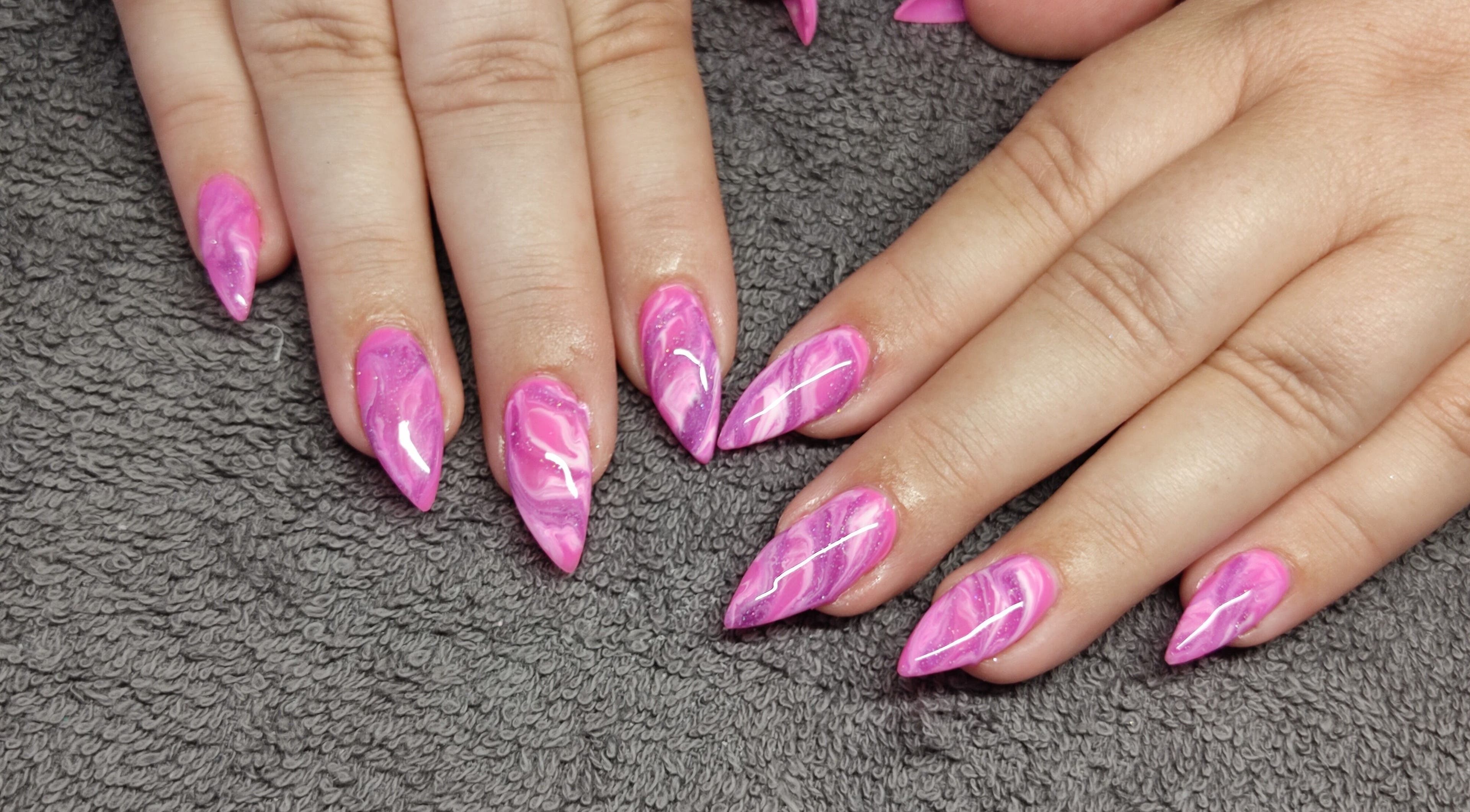 Pink marbled nails from Black Cat Collective in Port Elizabeth, Eastern Cape, ZA, showcasing unique nail artistry.