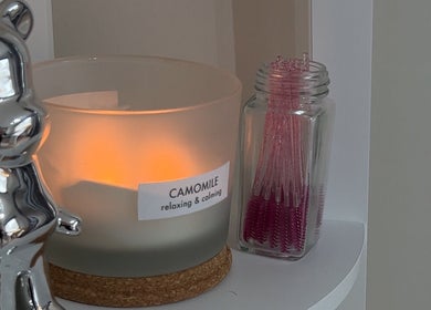 Cozy candle setup at By Charlotte (Home Beauty Room), Penrith, England, GB, offering relaxing ambiance.