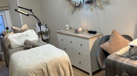 Serene therapy room with soft lighting at By Charlotte, Penrith, England, GB, offering a calming wellness experience.