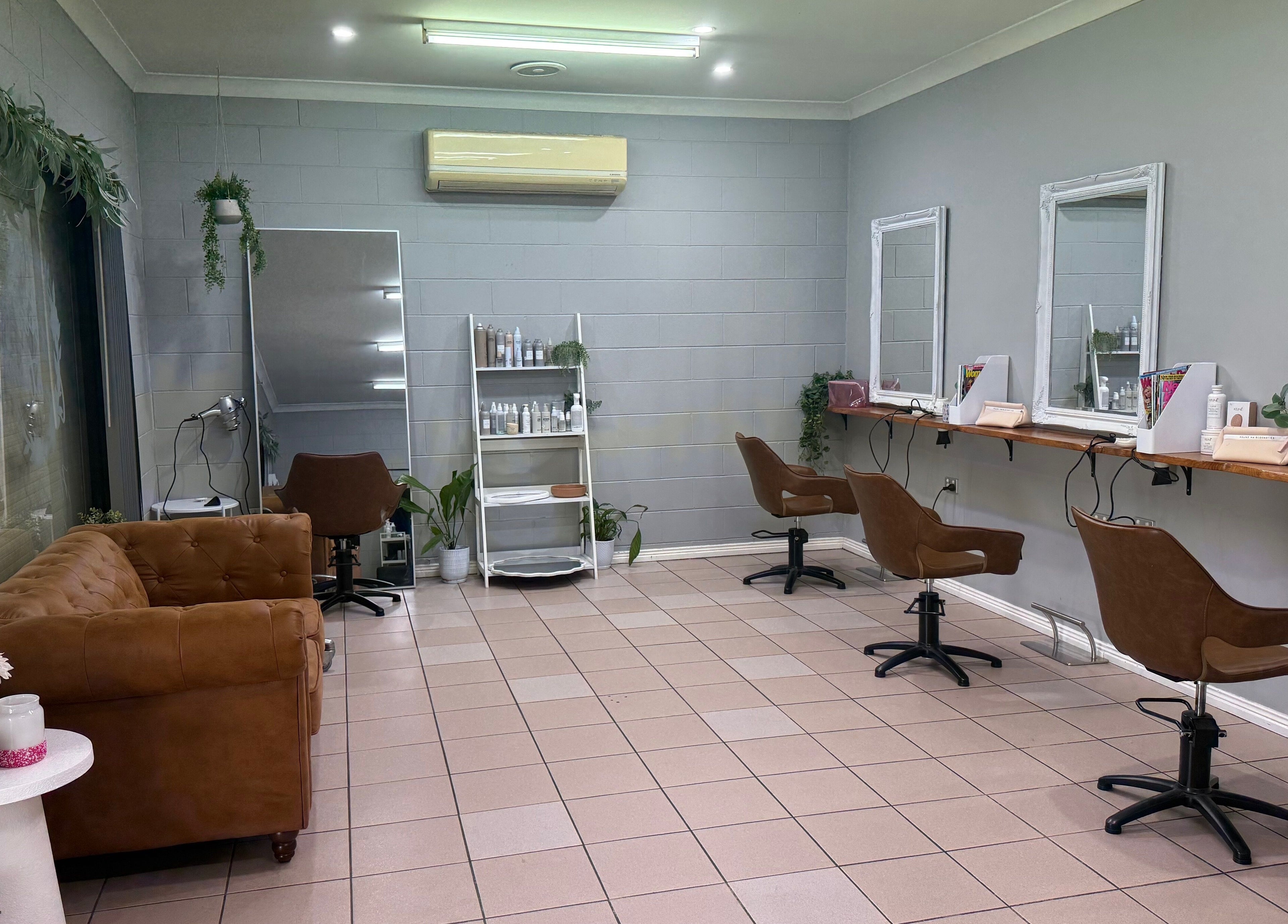 Gloss Creations in Wallerawang, NSW, AU features modern salon seating and decor for a chic beauty experience.