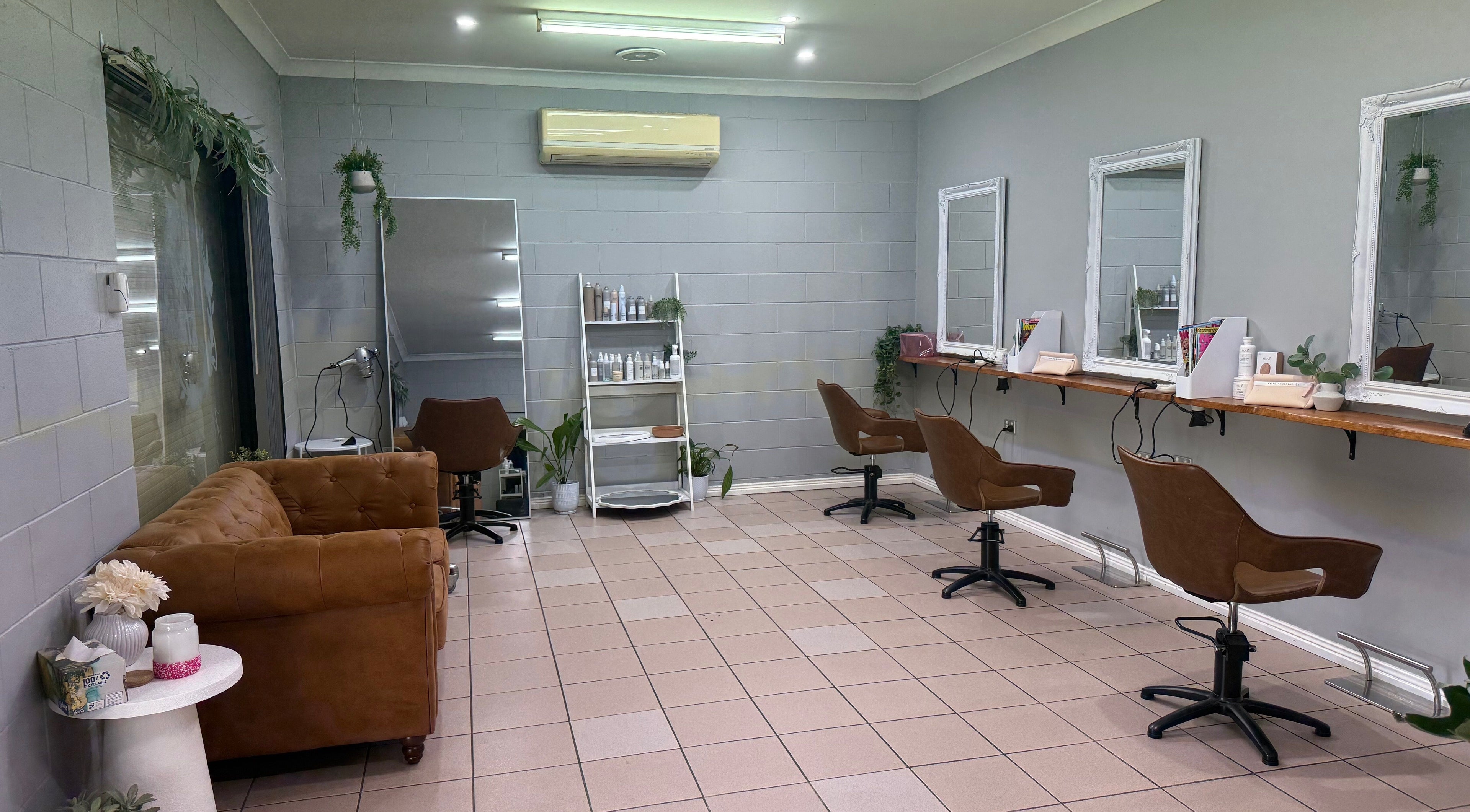Gloss Creations in Wallerawang, NSW, AU features modern salon seating and decor for a chic beauty experience.