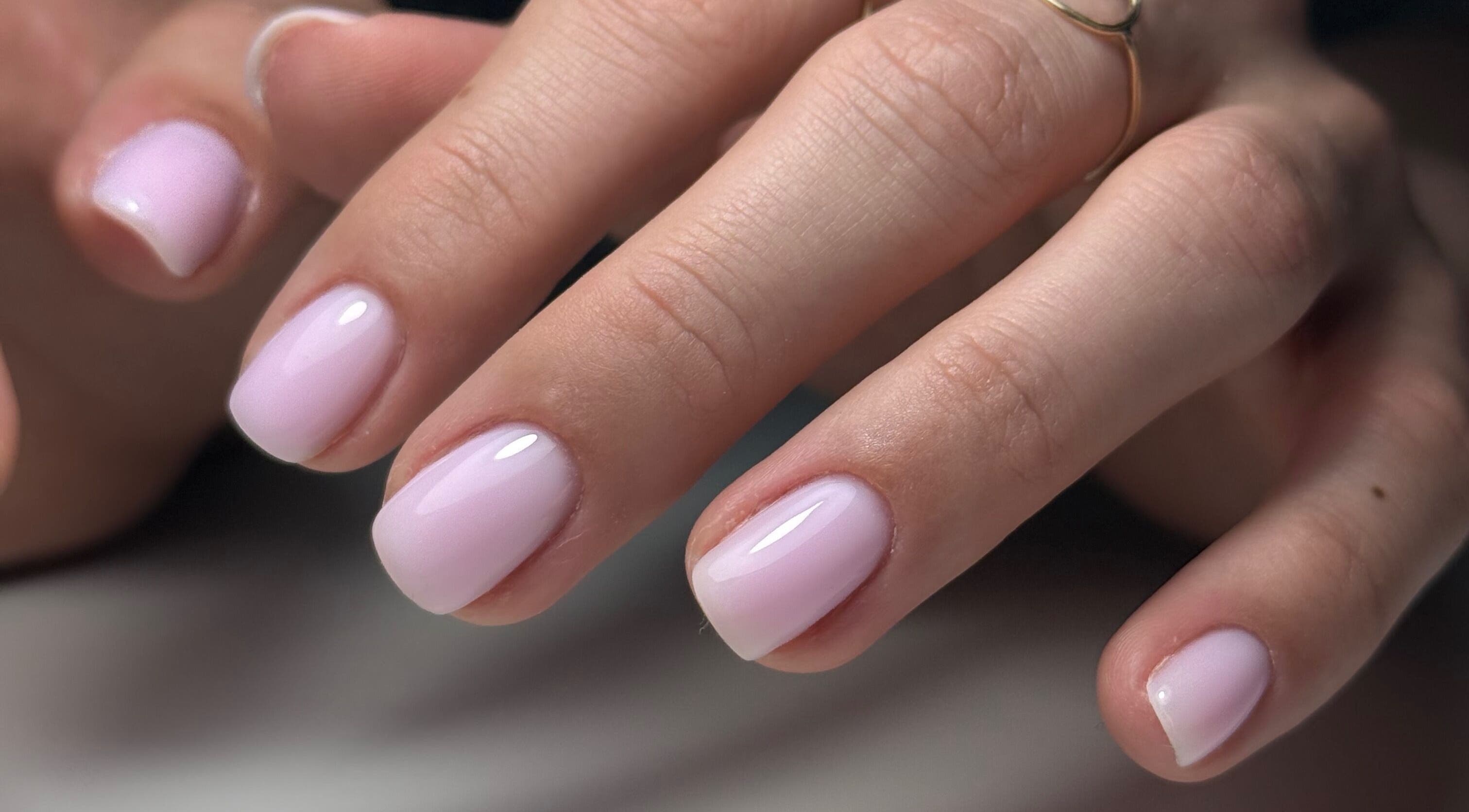 Stylish pink manicure at Nakey Nails, South Ripley, Queensland, AU, showcasing professional nail care.