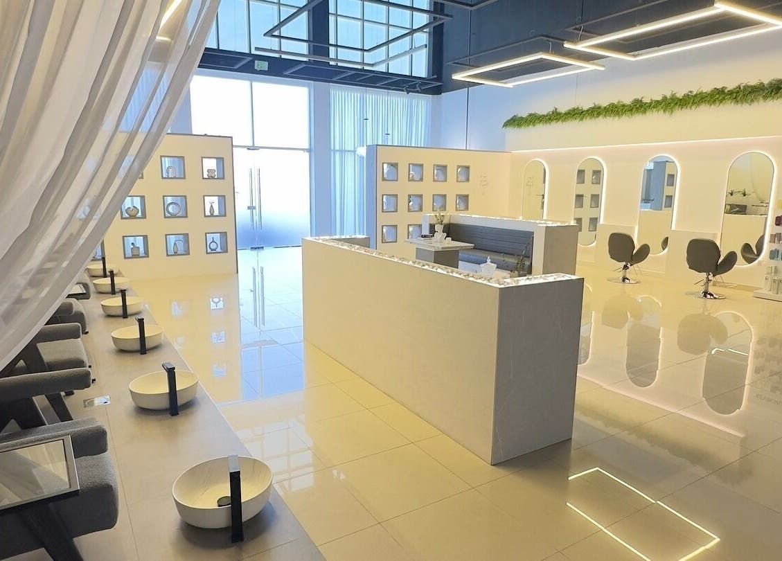 Elegant interior of Weekdays Salon & Spa, Sharjah, AE, featuring modern decor and comfortable seating.