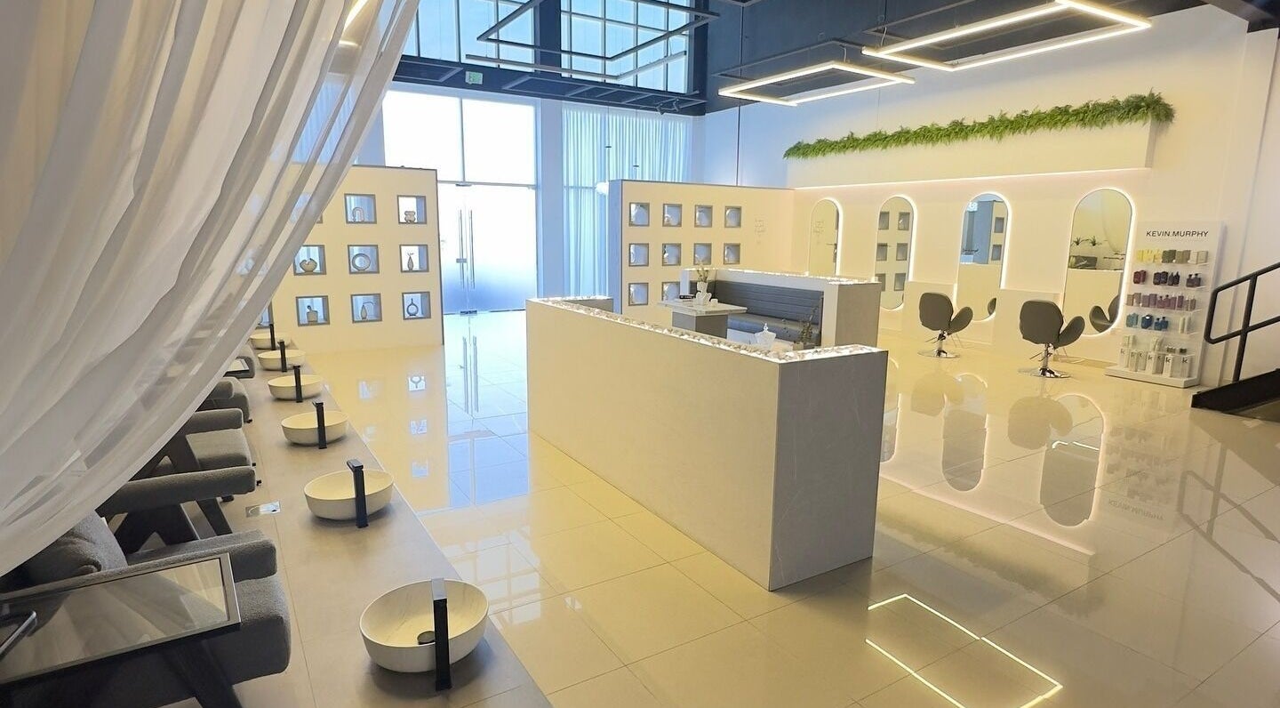 Elegant interior of Weekdays Salon & Spa, Sharjah, AE, featuring modern decor and comfortable seating.