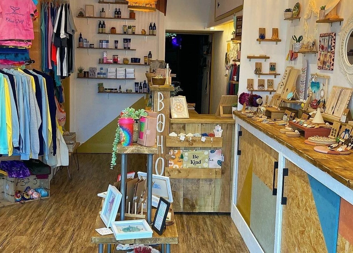 Vibrant interior of Boho Beauty in Braunton, England, GB, showcasing apparel, accessories, and decor.
