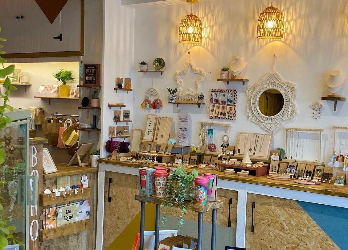 Handcrafted decor display at Boho Beauty, Braunton, England, GB, with vibrant jewelry and accents.