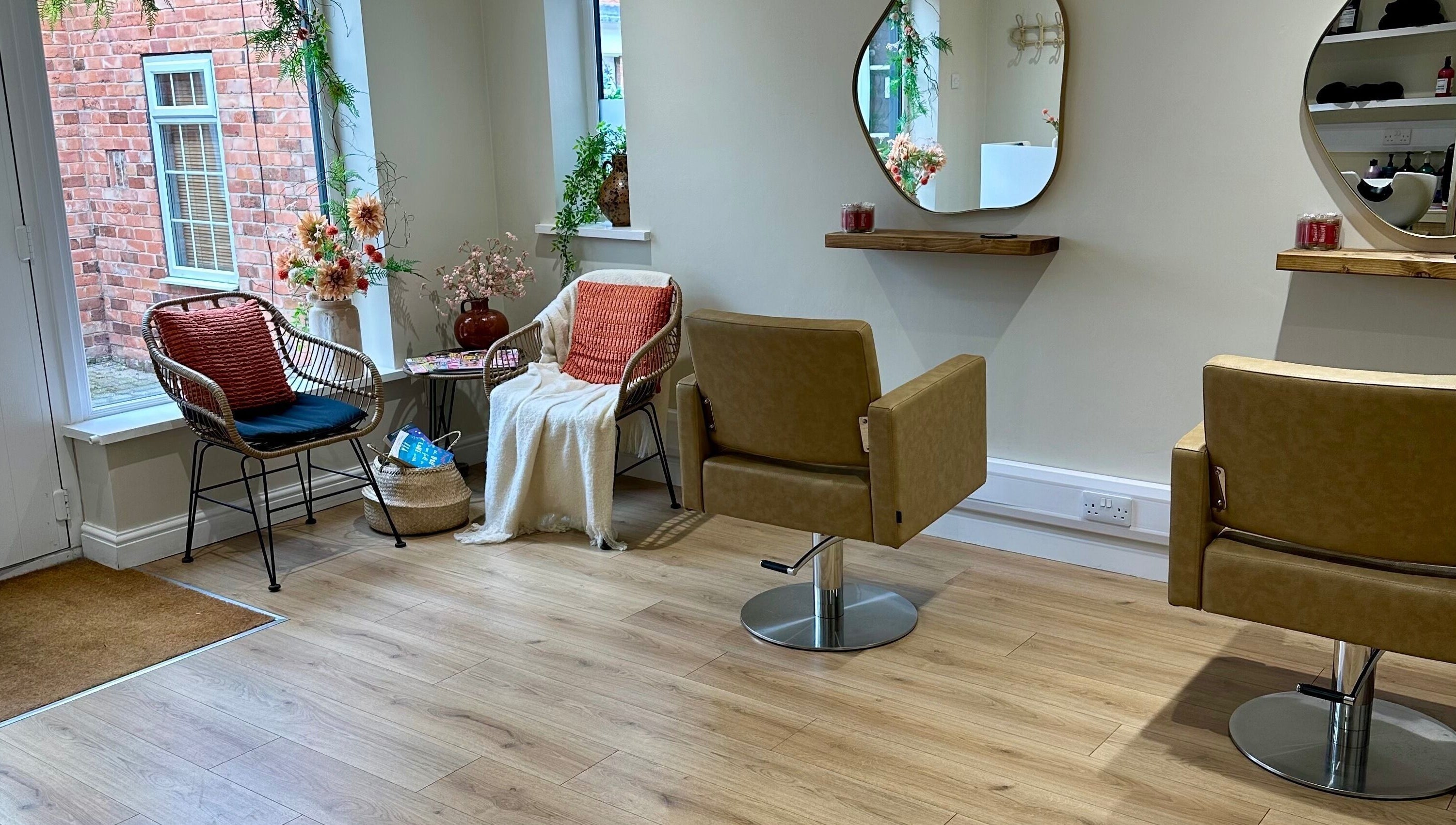 Inviting salon chairs and decor at Faith & Co., Epworth, England, GB. A serene beauty and wellness space.