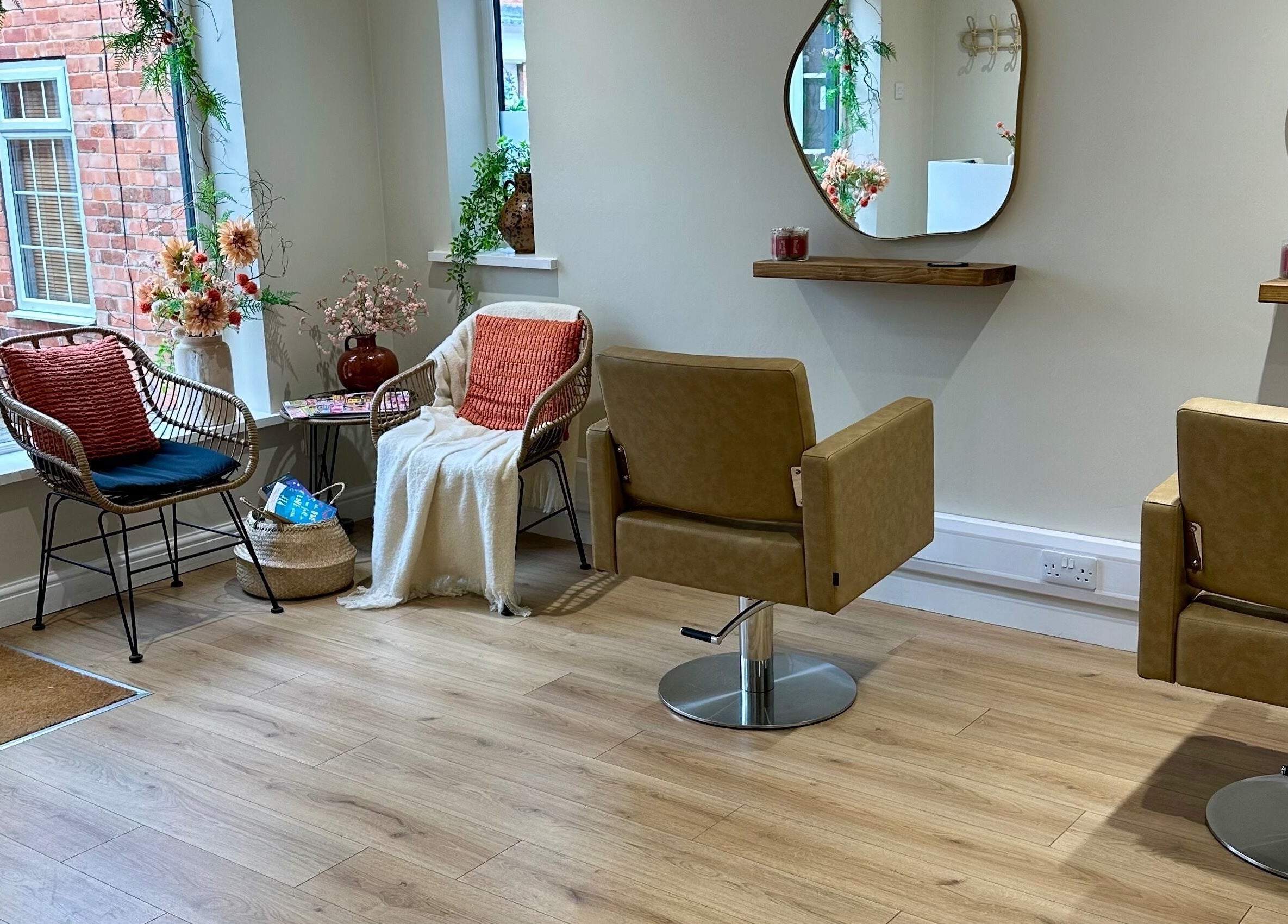 Inviting salon chairs and decor at Faith & Co., Epworth, England, GB. A serene beauty and wellness space.