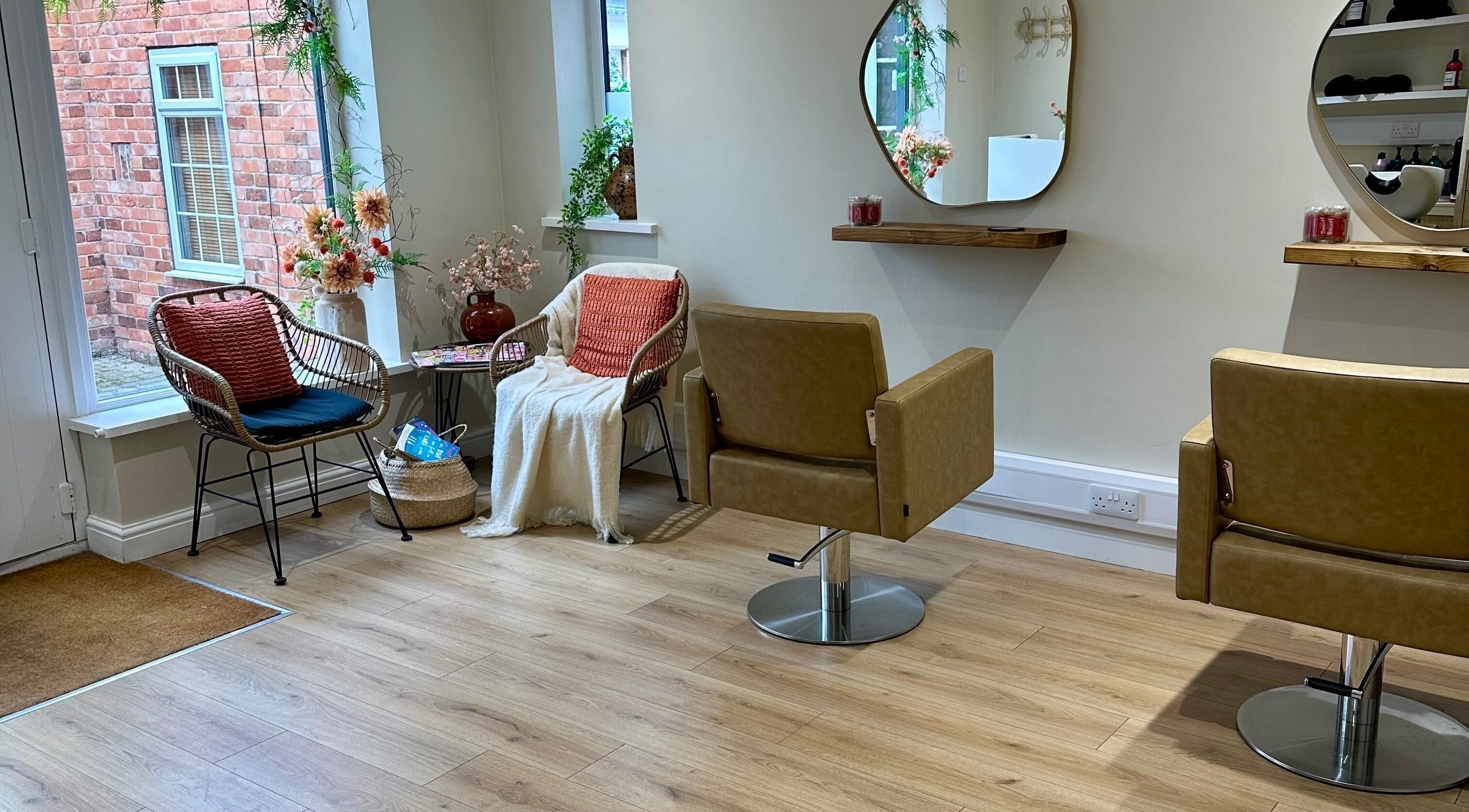 Inviting salon chairs and decor at Faith & Co., Epworth, England, GB. A serene beauty and wellness space.