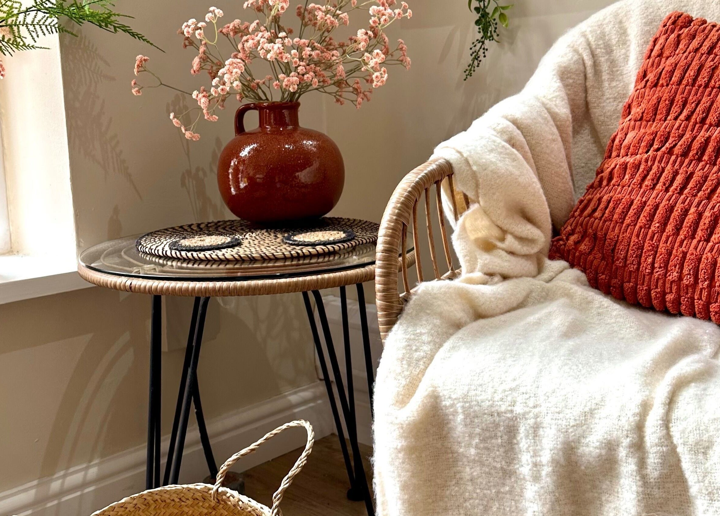 Charming cozy nook at Faith & Co., Epworth, England, GB with comfy seating and floral decor.