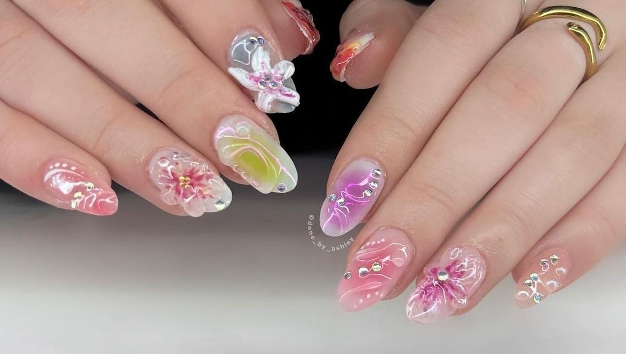 Intricate floral nail art at Studio Ashley, Melbourne, Victoria, AU. Chic designs in vivid colors.
