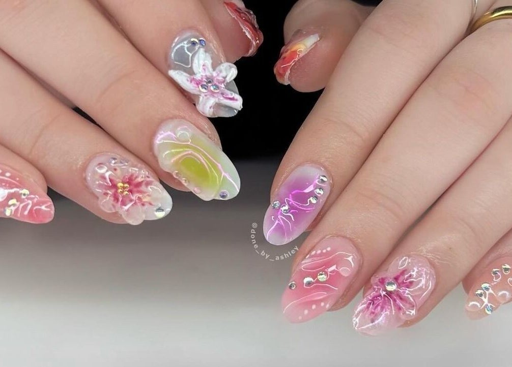 Intricate floral nail art at Studio Ashley, Melbourne, Victoria, AU. Chic designs in vivid colors.