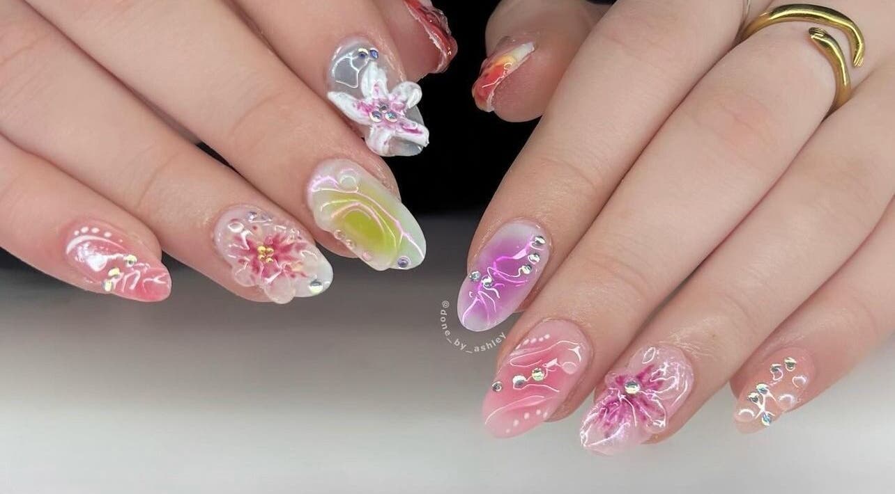 Intricate floral nail art at Studio Ashley, Melbourne, Victoria, AU. Chic designs in vivid colors.
