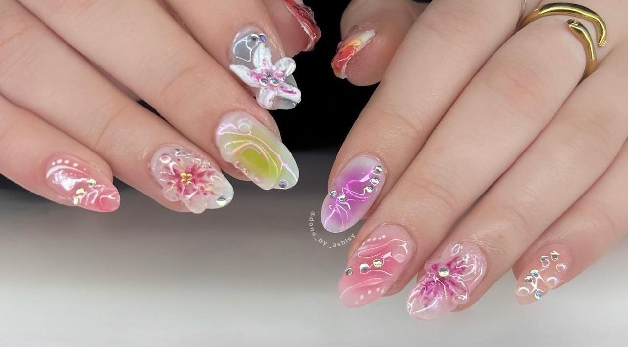 Intricate floral nail art at Studio Ashley, Melbourne, Victoria, AU. Chic designs in vivid colors.