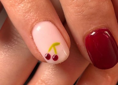 Cherry nail art detail at The Luxury Nail Bar, Tweedbank, Scotland, GB, showcasing intricate design.