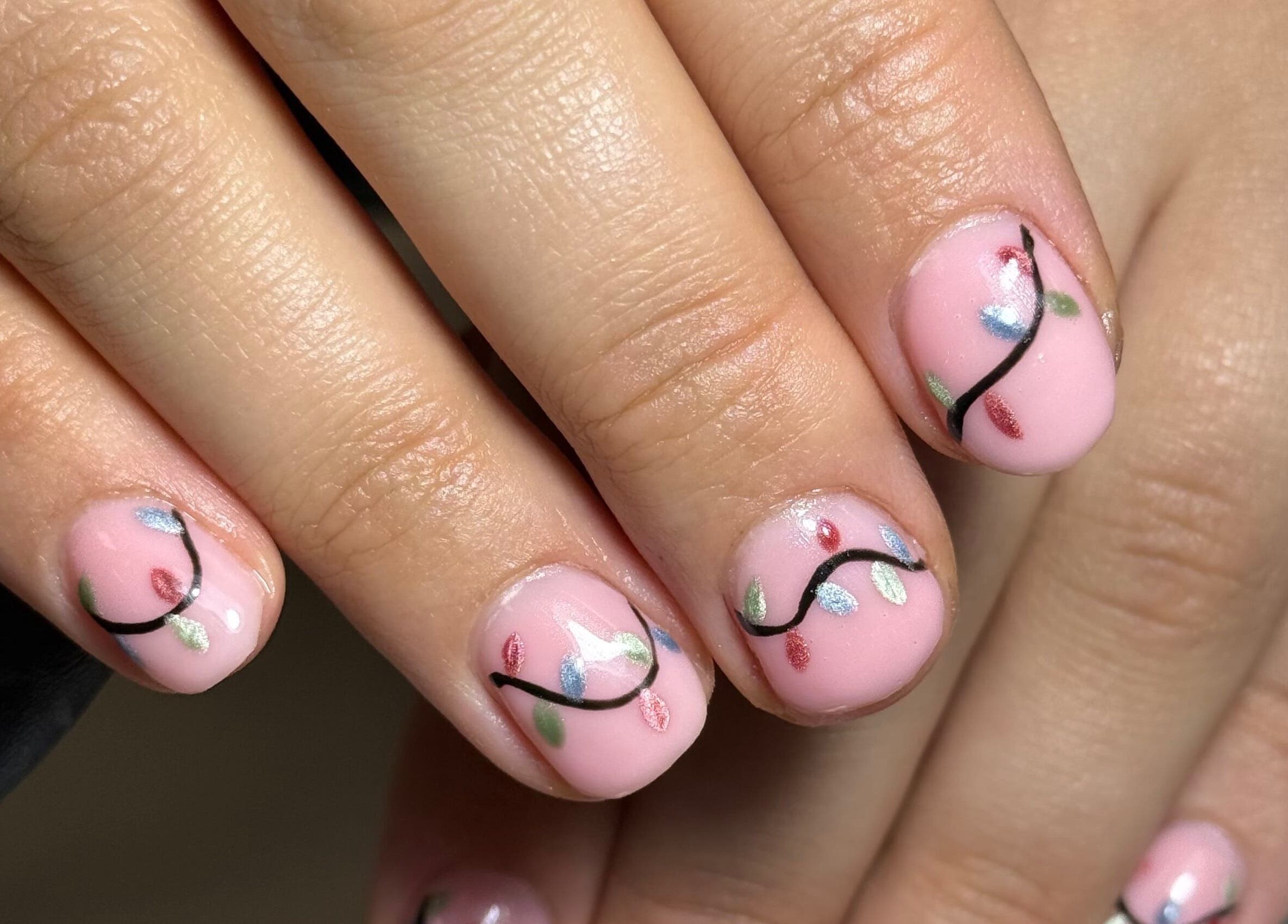 Elegant floral nail art design at The Luxury Nail Bar, Galashiels, Scotland, GB.