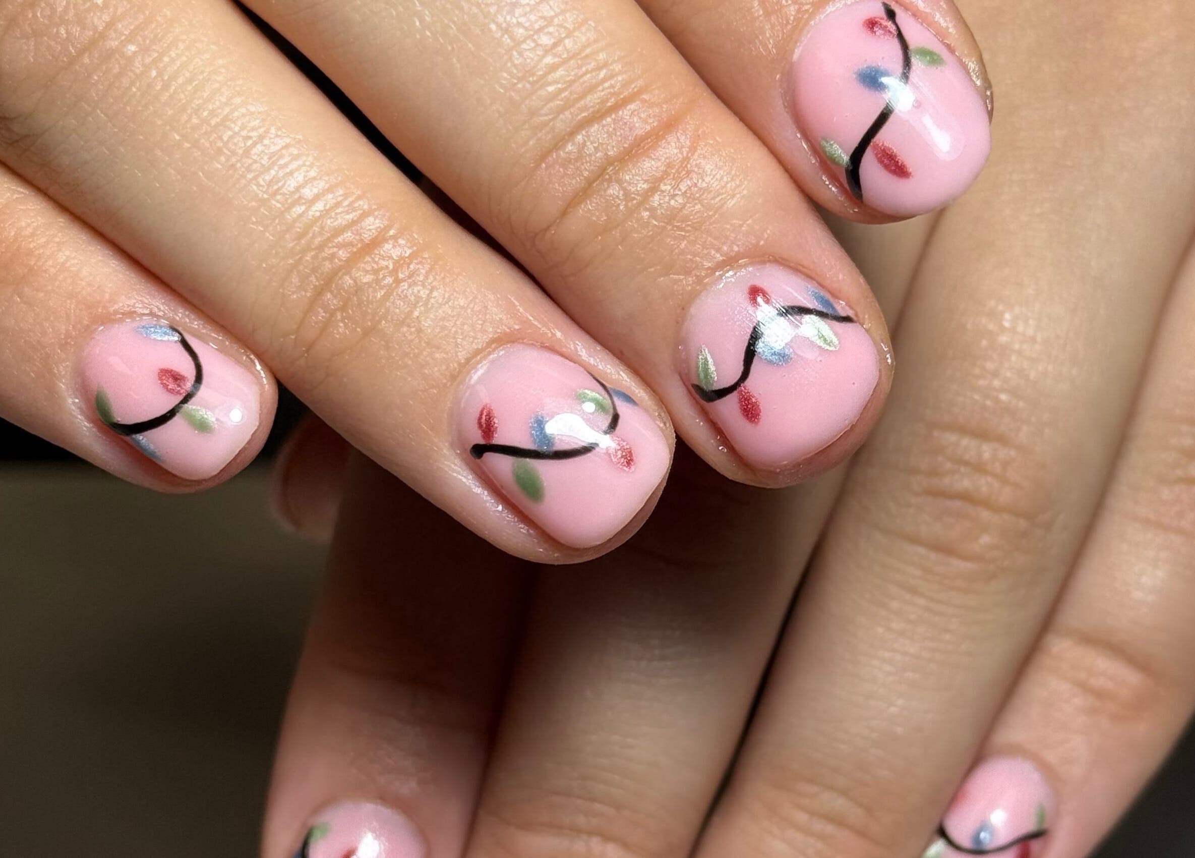 Elegant nail art with floral design at The Luxury Nail Bar, Galashiels, Scotland, GB.
