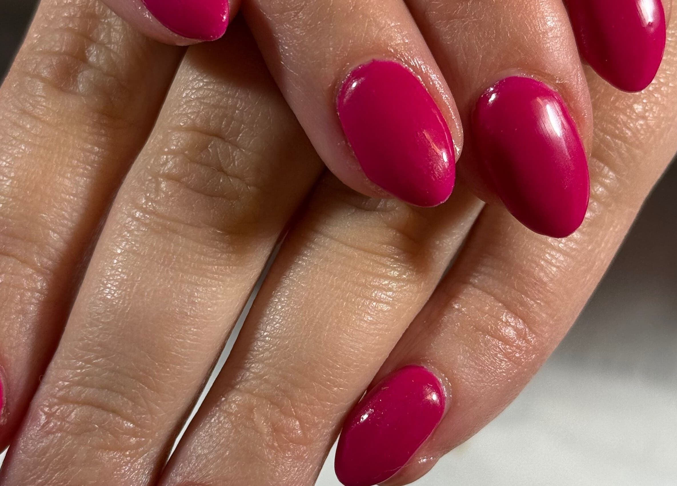 Fuchsia nails at The Luxury Nail Bar in Galashiels, Scotland, GB showcase exquisite manicure artistry.