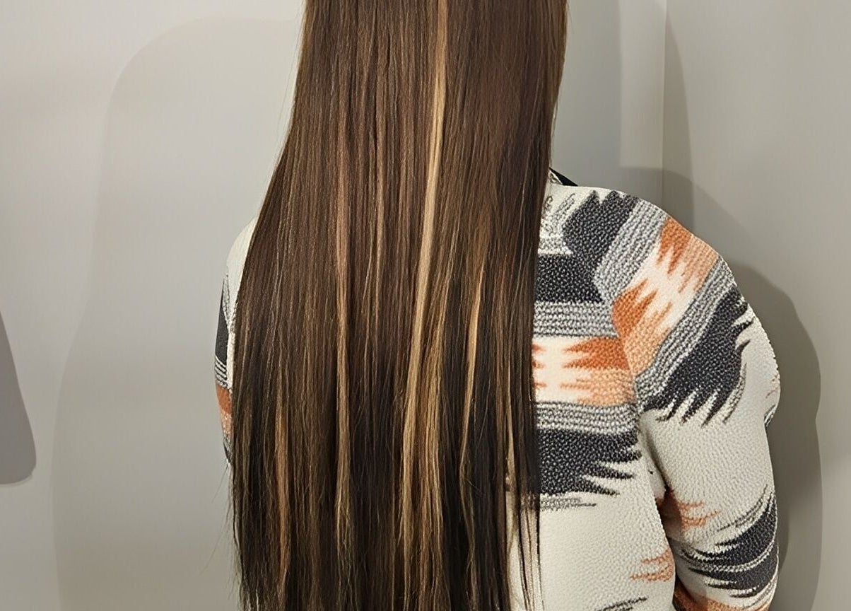 Long, highlighted hair at Balanced Hair, Dieppe, New Brunswick, CA salon.