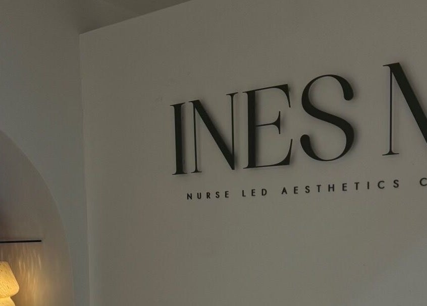 Ines Medics sign with elegant lighting at Grantham, England, GB, showcasing their aesthetic clinic interior.