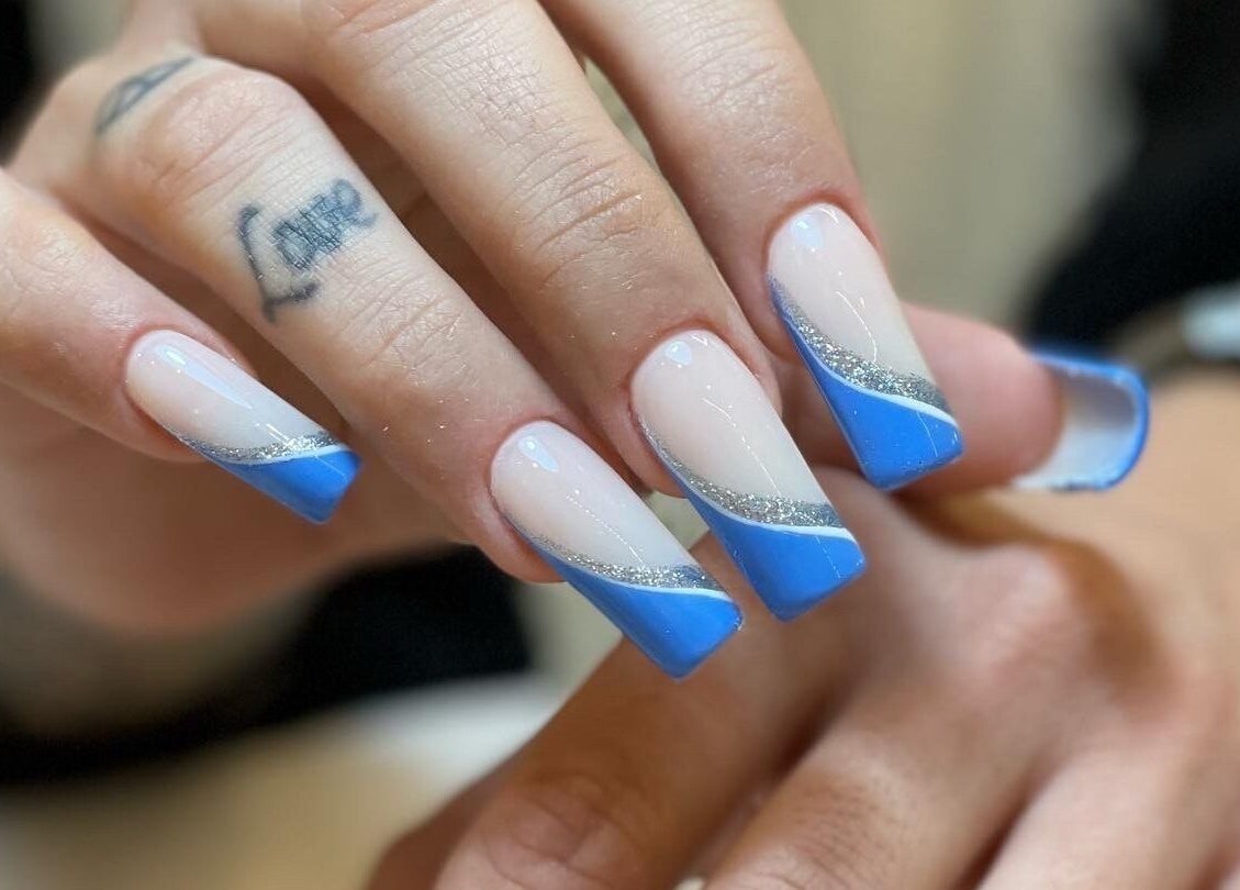 Blue and silver nail art at DIELLANAILS, Toronto, Ontario, CA showcasing elegant design.