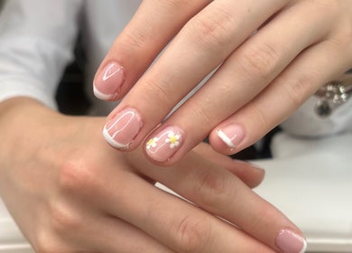 Elegant floral French manicure at The Beauty Loft Limerick, Limerick, County Limerick, IE, showcasing beautiful nail art.