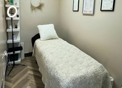 Cozy treatment room at GHB Beauty, Great Wyrley, England, GB, featuring a soft bed and peaceful decor.