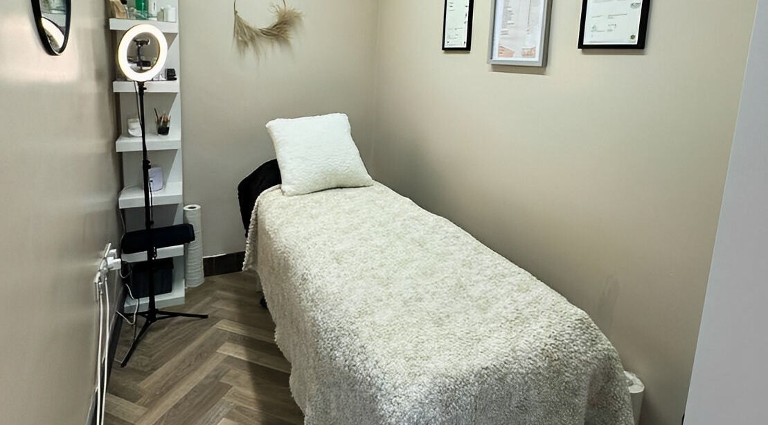 Cozy treatment room at GHB Beauty, Great Wyrley, England, GB, featuring a soft bed and peaceful decor.