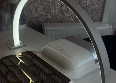 Elegant nail station at GHB Beauty, Great Wyrley, England, GB, featuring a modern lamp and equipment.