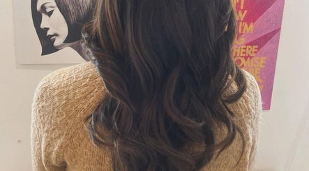 Back view of styled brown curls at Studio B, Cardiff, Wales, GB.