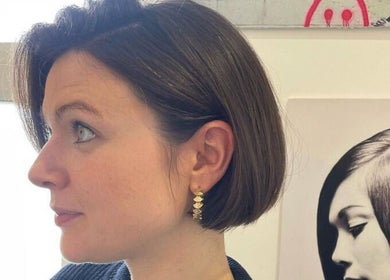 Elegant hairstyle at Studio B, Cardiff, Wales, GB showcasing a sleek bob cut.