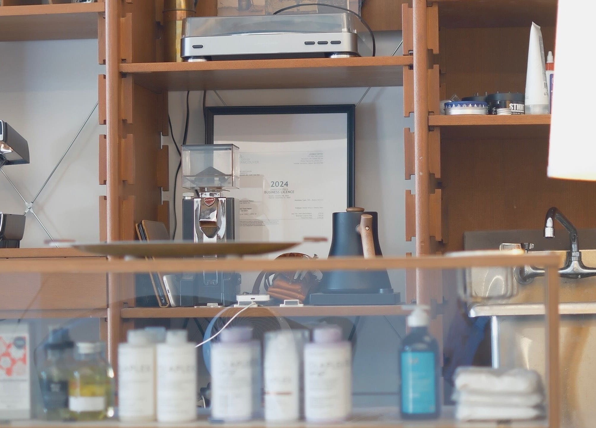 Shelves with beauty products and equipment at cafune. west, Vancouver, British Columbia, CA.