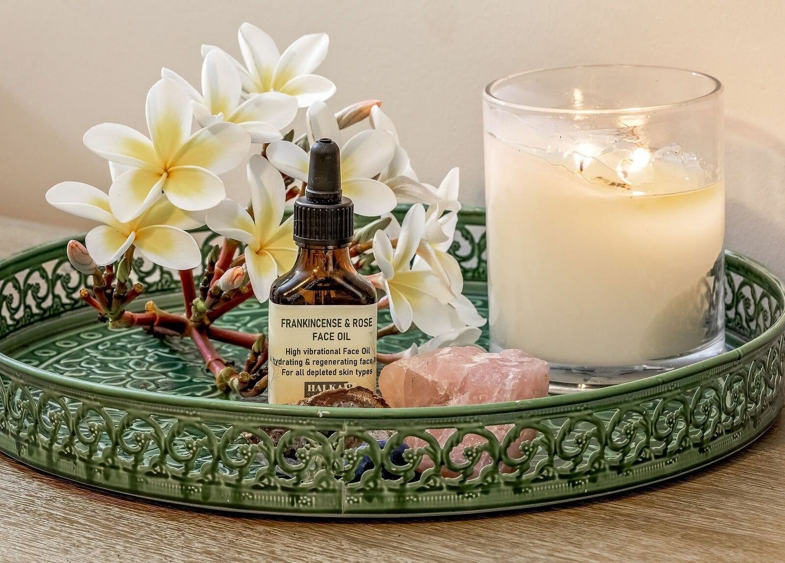 Frankincense oil, flowers, and candle at Dharma Massage & Movement in Abbey, Western Australia, AU.