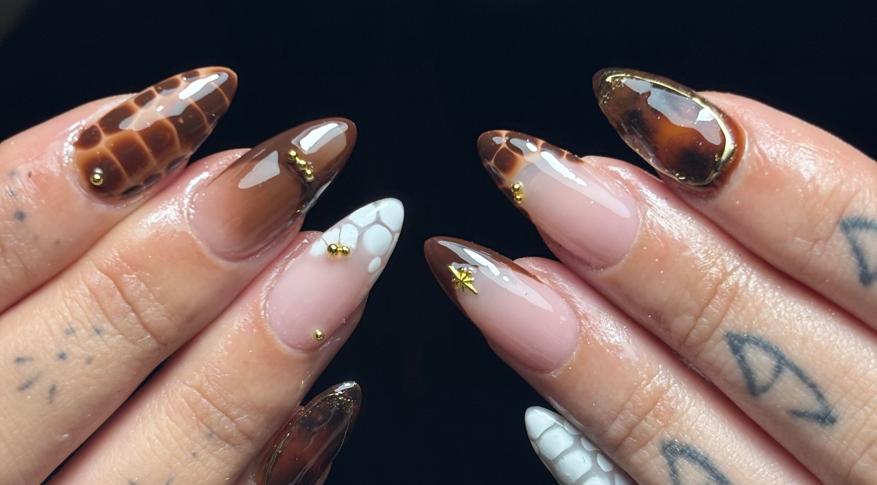 Stylish nail art at Beth’s Beauty Bar in Whittlesey, England, GB, showcasing exquisite designs and colors.