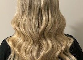 Blonde wavy hair extensions at Katie Brady Hair Extensions, Smiths Falls, Ontario, CA.