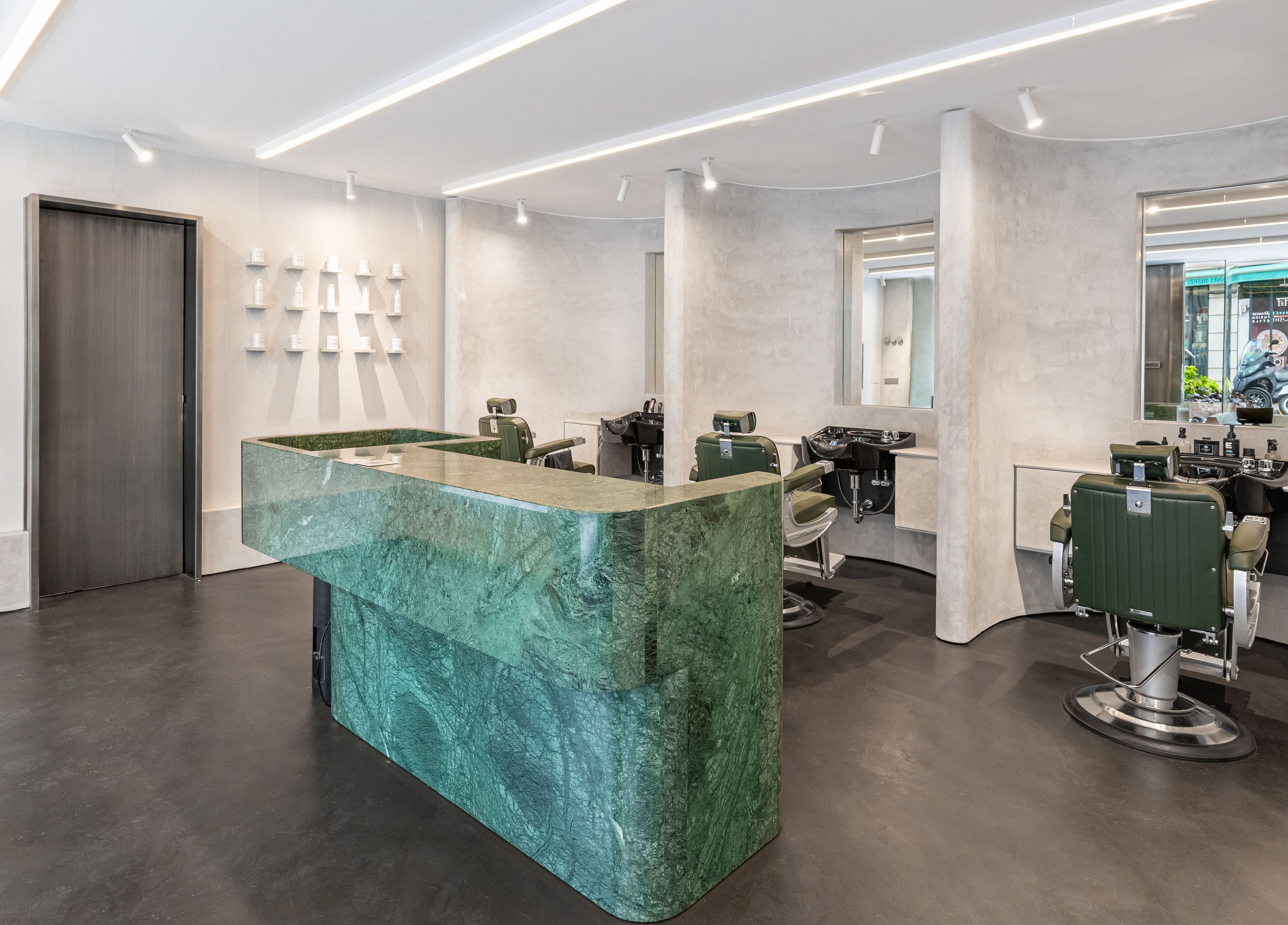 Modern salon interior at Melrose, Cannes, Provence-alpes-côte D'azur, FR with stylish green accents and sleek design.