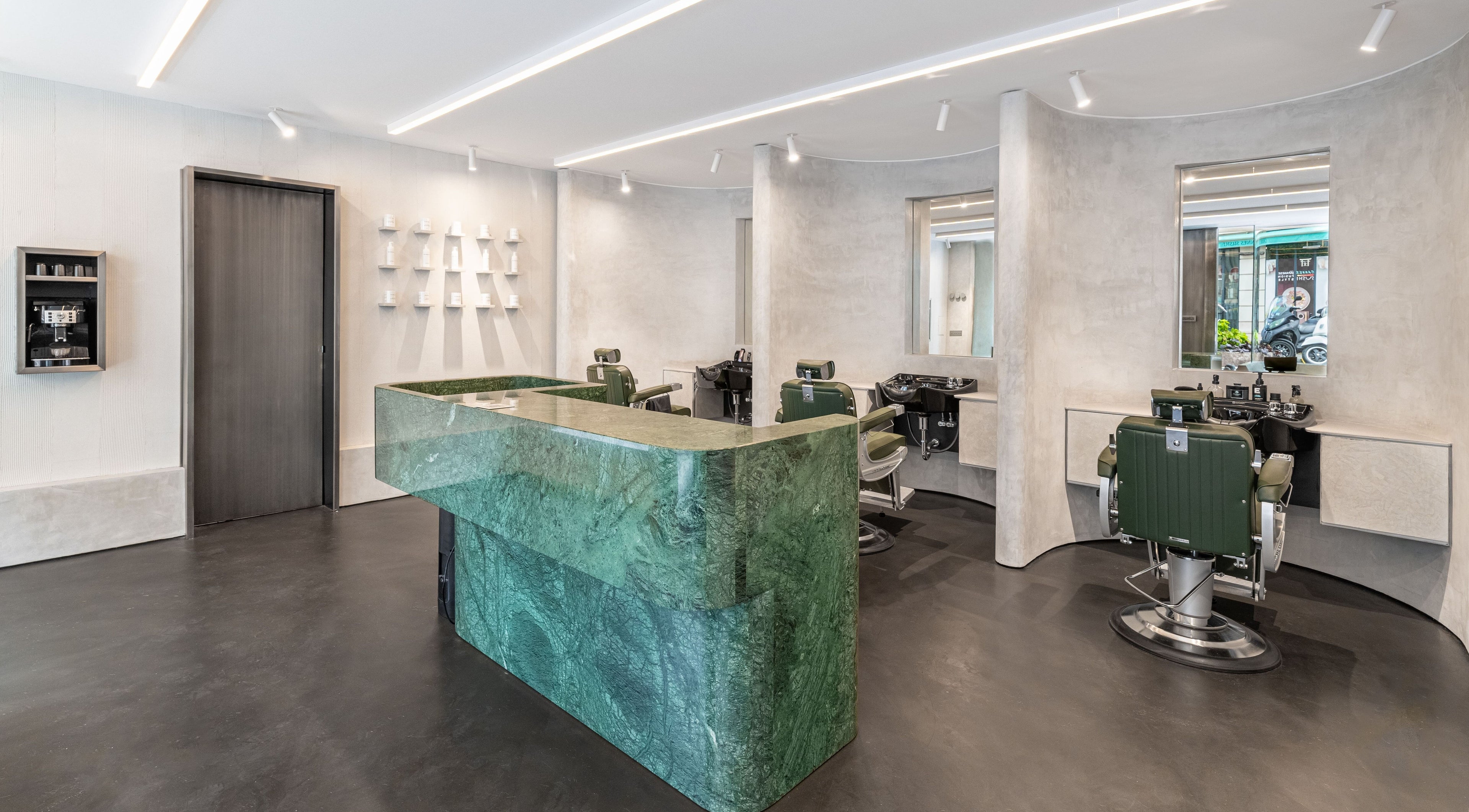 Modern salon interior at Melrose, Cannes, Provence-alpes-côte D'azur, FR with stylish green accents and sleek design.