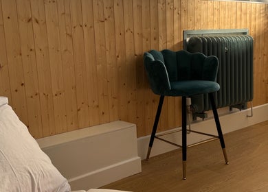 Chic seating at Jennifer Young Wellness Clinic, Madeley, England, GB. Inviting and serene interior design.