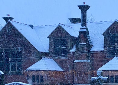 Snow-covered Jennifer Young Wellness Clinic in Madeley, England, GB, creating a serene winter ambiance.