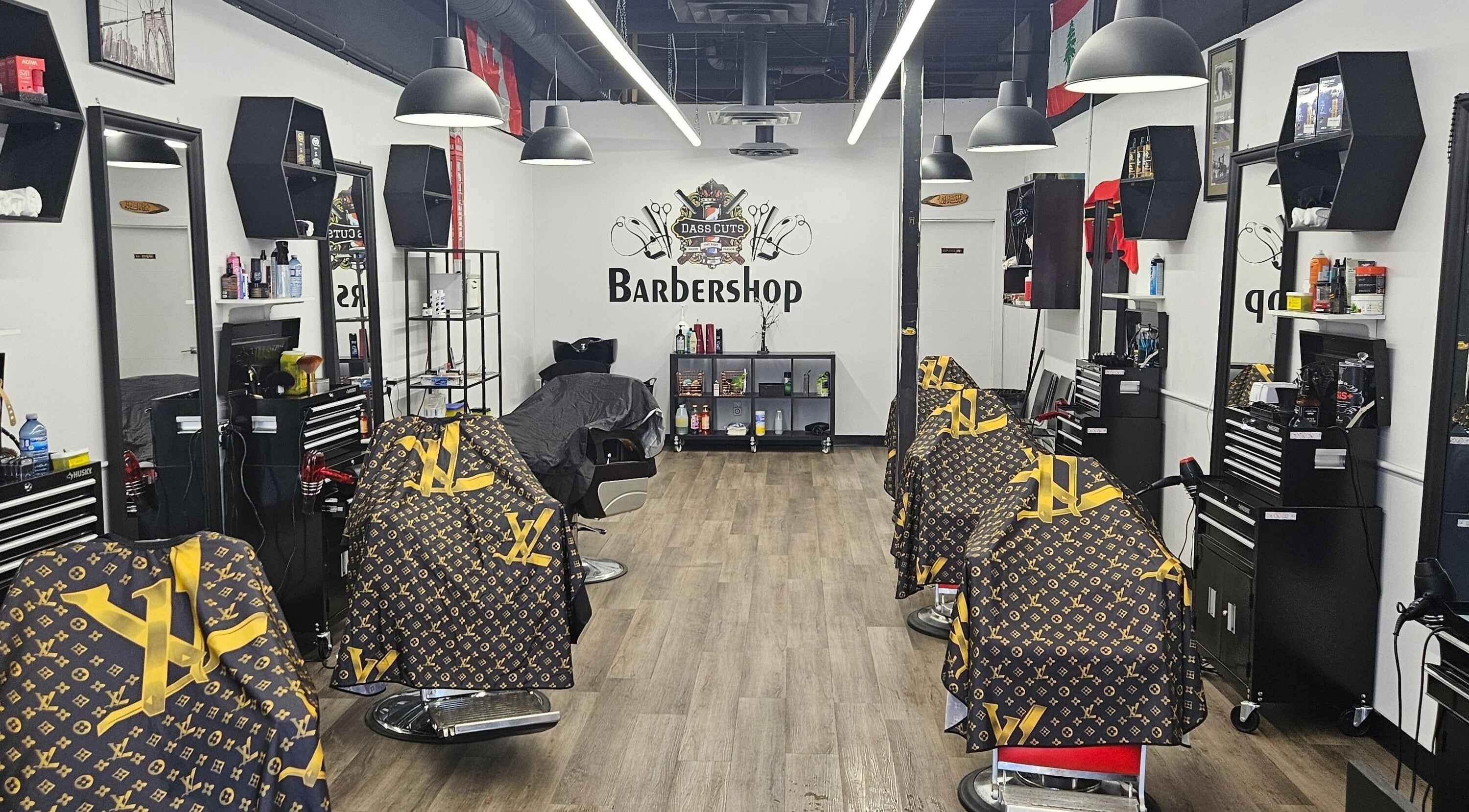 Inside view of Dass Cuts Barbershop in Calgary, Alberta, CA, showcasing stylish barber chairs and modern decor.
