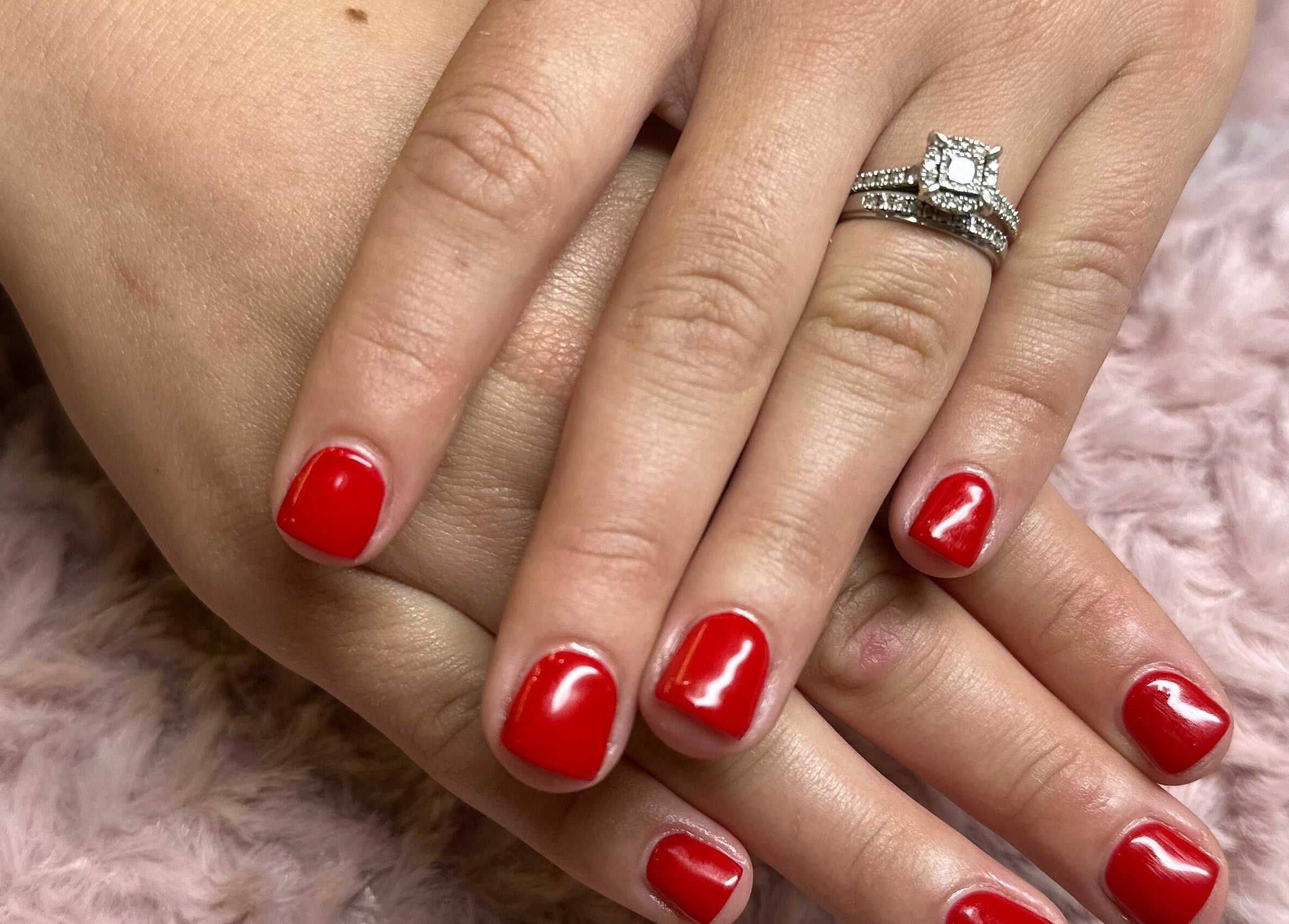 Elegant red nails with diamond ring at JD’s Hair Affair in Clermont, Queensland, AU.