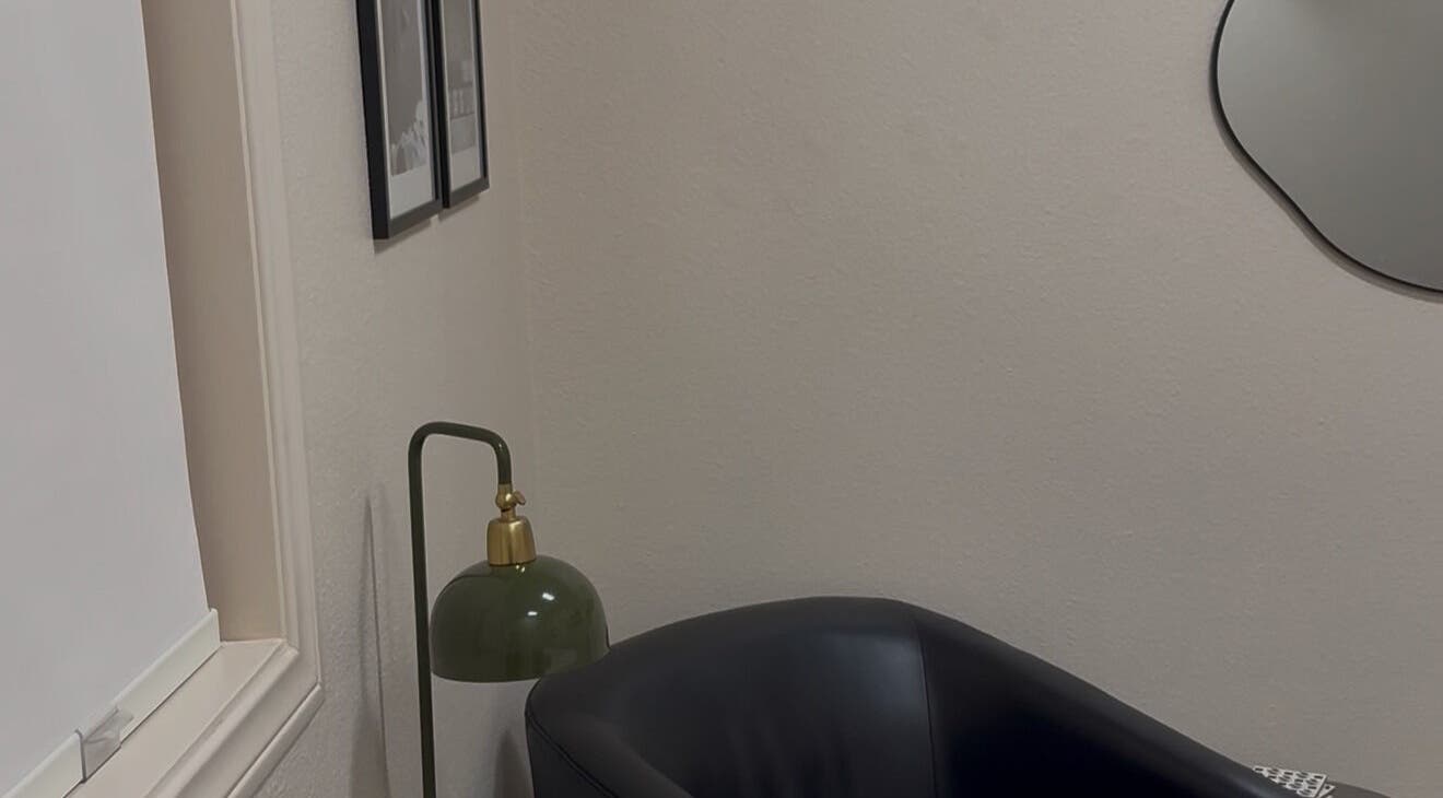 Cozy corner with chair and lamp at Blushed by Gaby, Palm Desert, California, US.