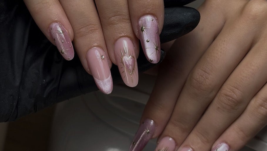 Elegant nail art showcasing pink designs at Lunar Beauty, Huthwaite, England, GB.