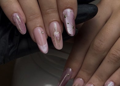 Elegant nail art showcasing pink designs at Lunar Beauty, Huthwaite, England, GB.