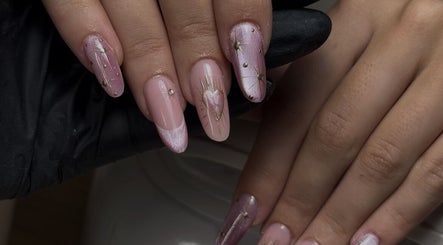 Elegant nail art showcasing pink designs at Lunar Beauty, Huthwaite, England, GB.
