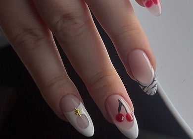 Elegant nail art featuring cherries at Lunar Beauty, Huthwaite, England, GB. Perfect for a stylish look.