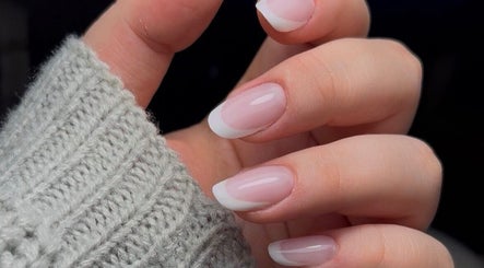 Manicured nails with elegant French tips at Lunar Beauty, Huthwaite, England, GB.